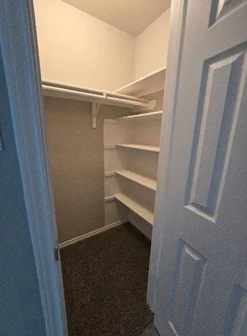 a white sink sitting next to a white toilet