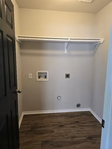 a view of a garden with lawn chairs