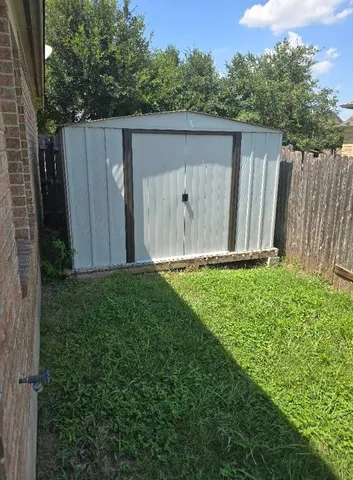 a view of a balcony with chairs