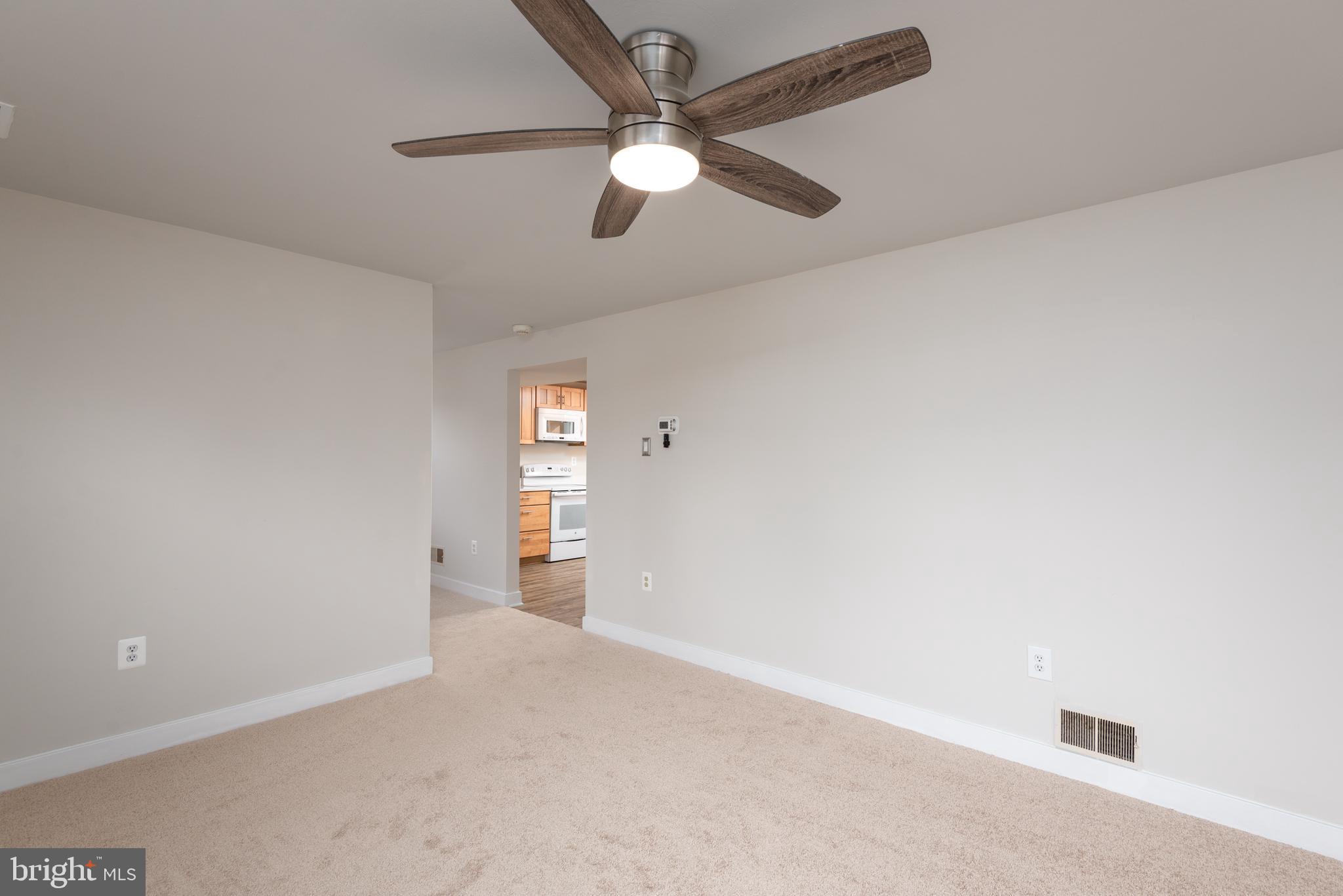 724 Chapelgate Drive Odenton, MD 21113 - Photo 12 of 26 an empty room with closet and windows