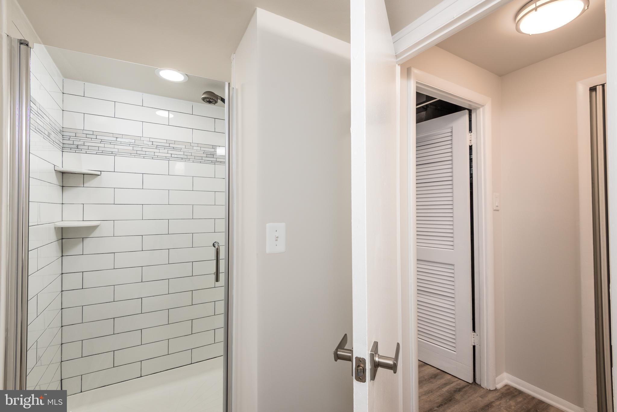 724 Chapelgate Drive Odenton, MD 21113 - Photo 7 of 26 a bathroom with a shower