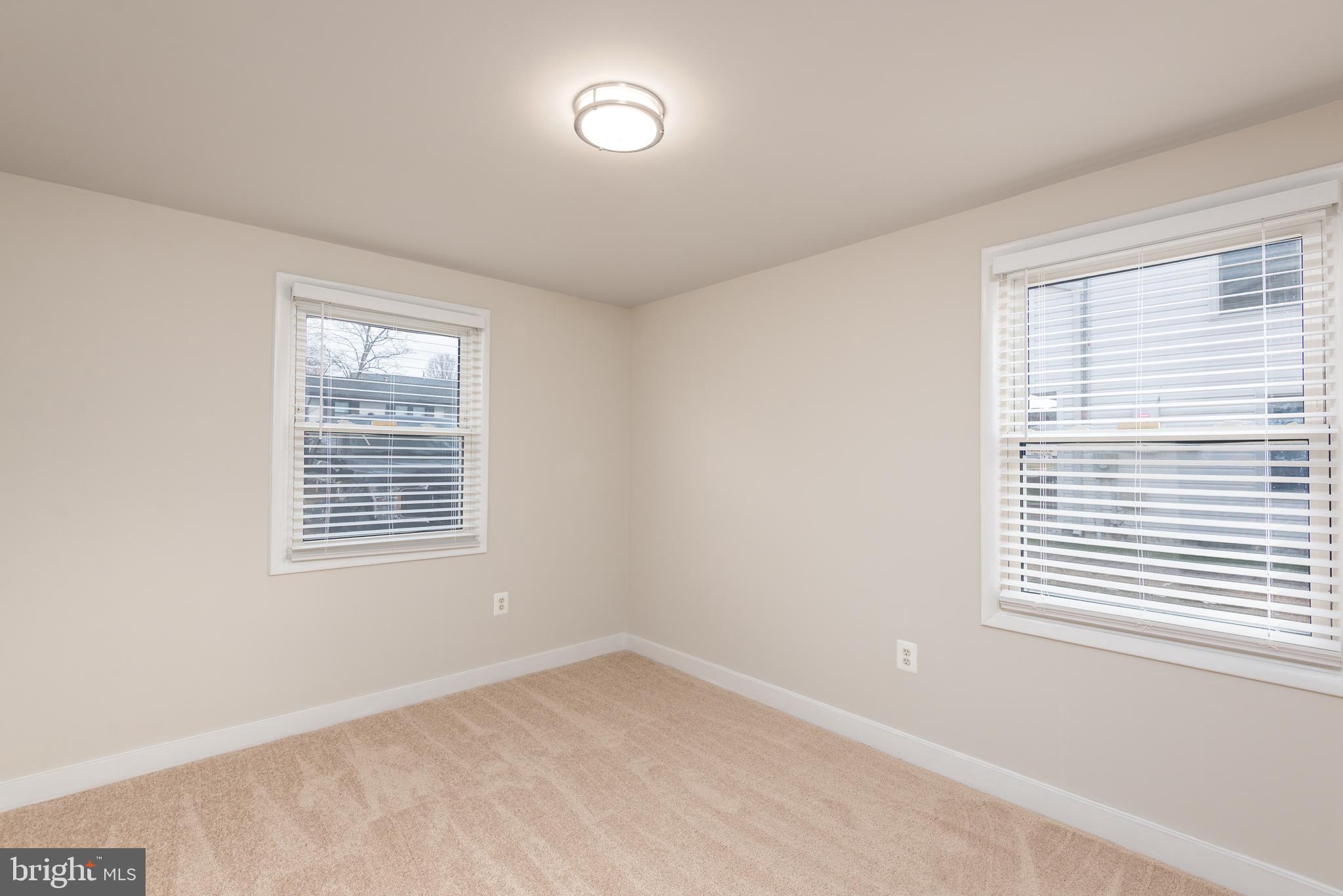 724 Chapelgate Drive Odenton, MD 21113 - Photo 9 of 26 an empty room with a window