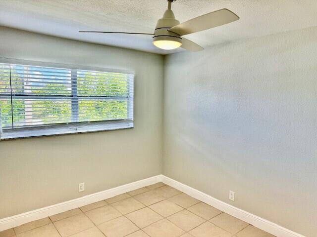 550 Southwest 2nd Avenue, Unit 224 Boca Raton, FL 33432 - Photo 13 of 33 an empty room with a window