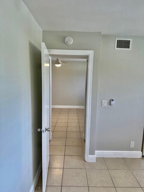 550 Southwest 2nd Avenue, Unit 224 Boca Raton, FL 33432 - Photo 18 of 33 a view of a livingroom with an empty space and closet