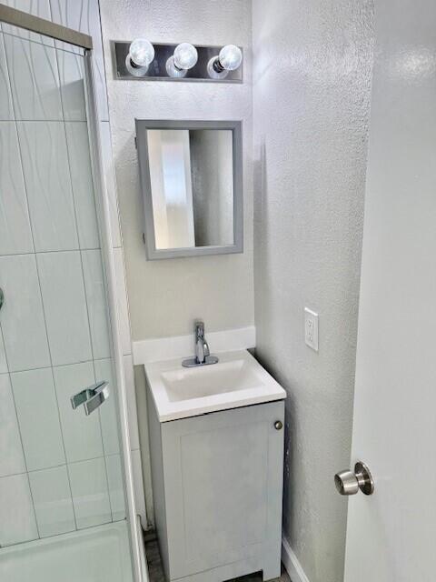 550 Southwest 2nd Avenue, Unit 224 Boca Raton, FL 33432 - Photo 30 of 33 a bathroom with a sink and mirror