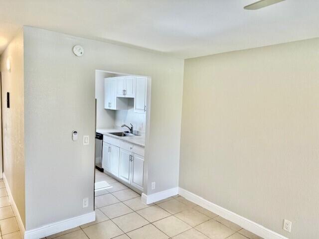 550 Southwest 2nd Avenue, Unit 224 Boca Raton, FL 33432 - Photo 5 of 33 a bathroom with a sink and a mirror