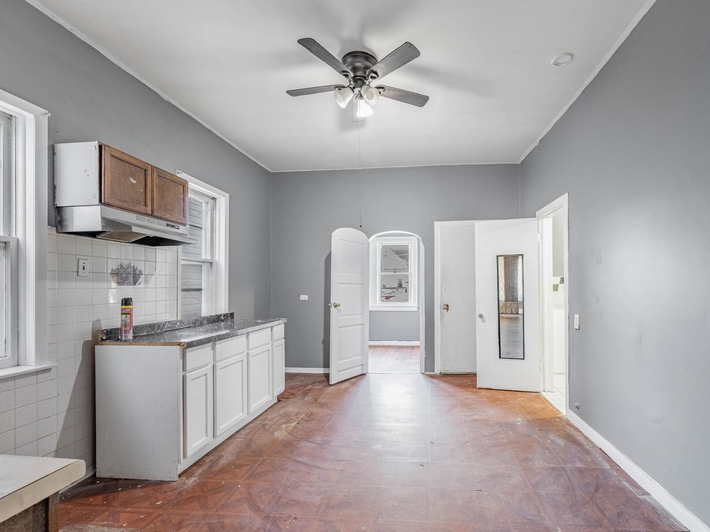 4722 South Ada Street Chicago, IL 60609 - Photo 5 of 14 a view of a kitchen with a sink and a refrigerator
