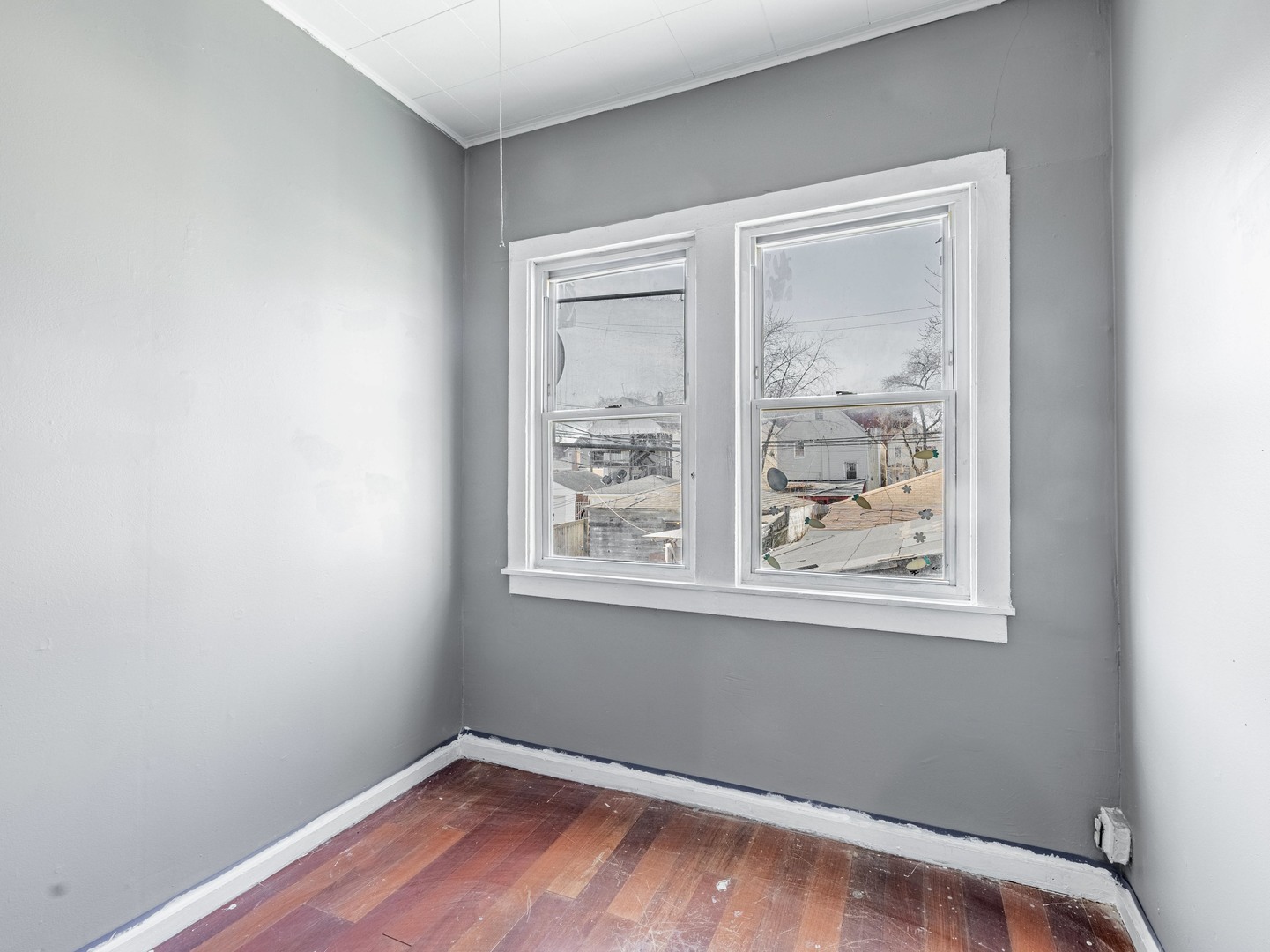 4722 South Ada Street Chicago, IL 60609 - Photo 8 of 14 an empty room with a window