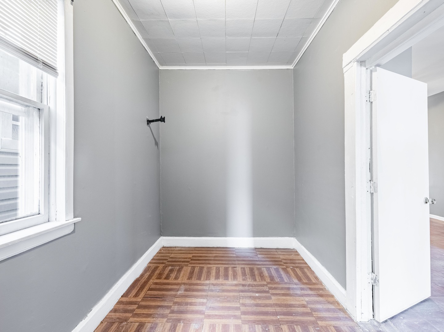 4722 South Ada Street Chicago, IL 60609 - Photo 10 of 14 a view of a room with a bed