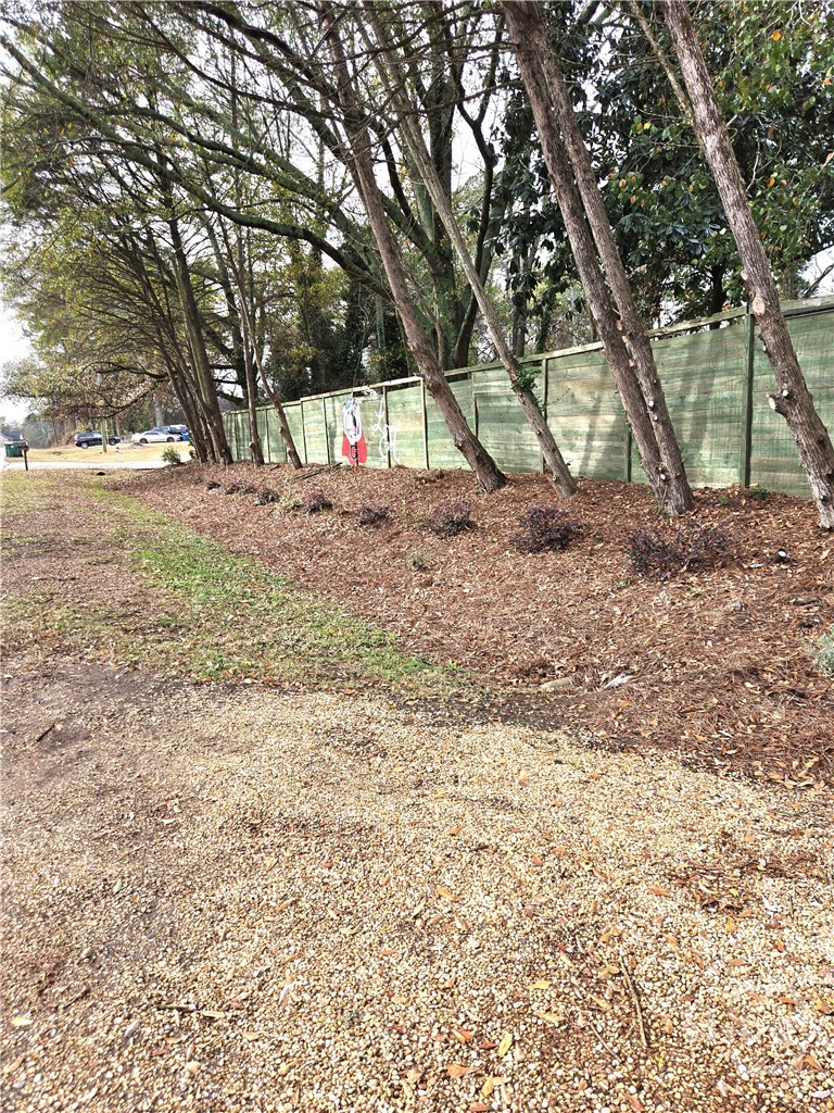 2569 Riverbend Road Athens, GA 30605 - Photo 37 of 44 Front yard and fence view from Riverbend.
