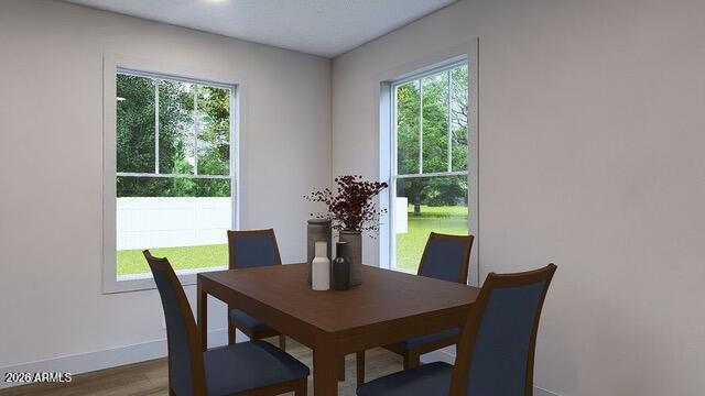 2604 9th Sundown Lane Snowflake, AZ 85937 - Photo 4 of 9 a view of a dining room with furniture window and wooden floor