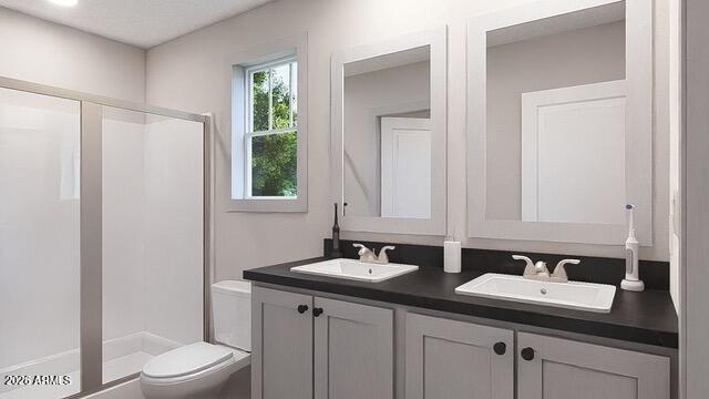 2604 9th Sundown Lane Snowflake, AZ 85937 - Photo 5 of 9 a bathroom with a sink a toilet and a mirror