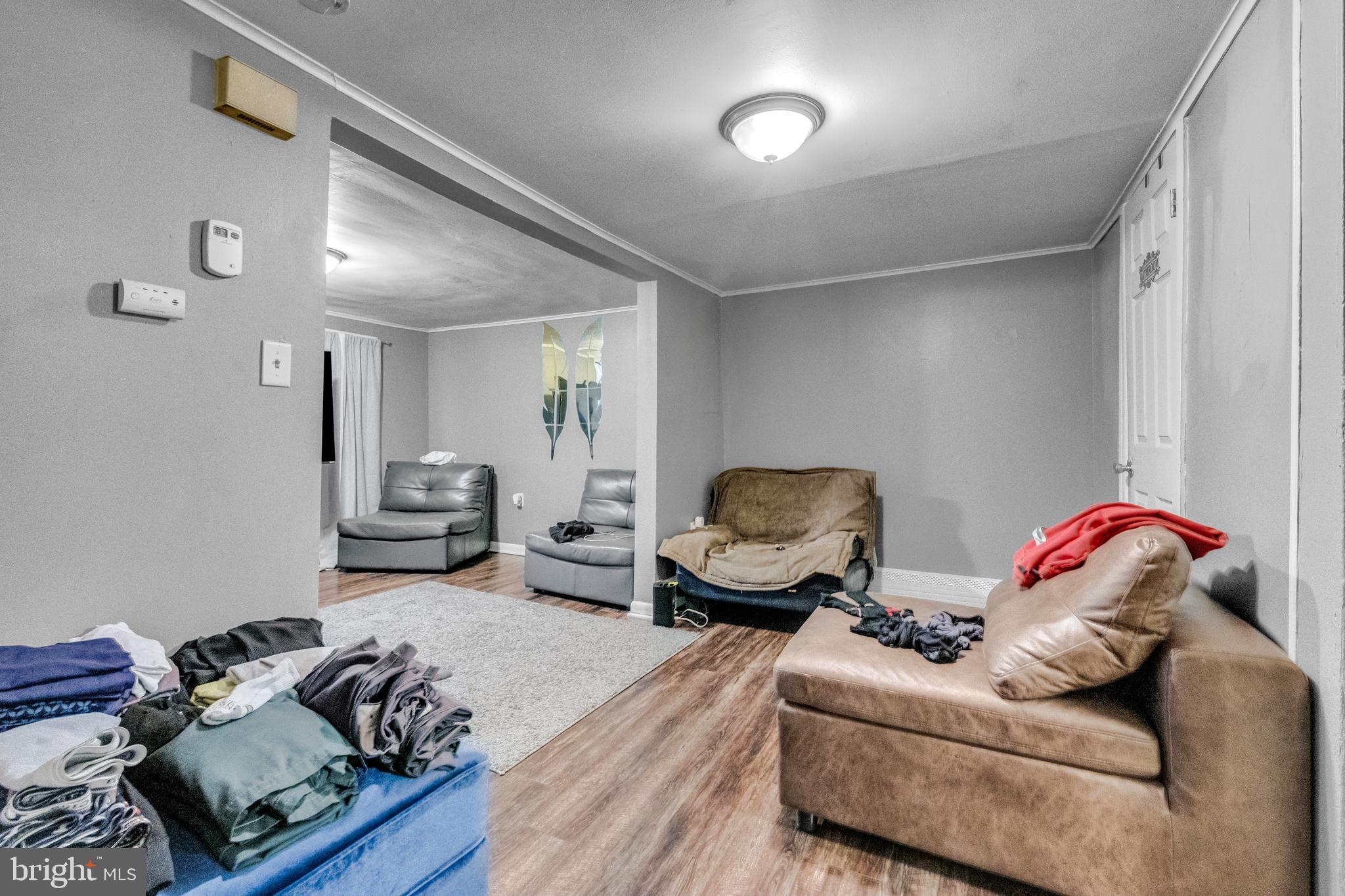 423 North Hall Street Allentown, PA 18102 - Photo 11 of 18 a living room with furniture and a couch
