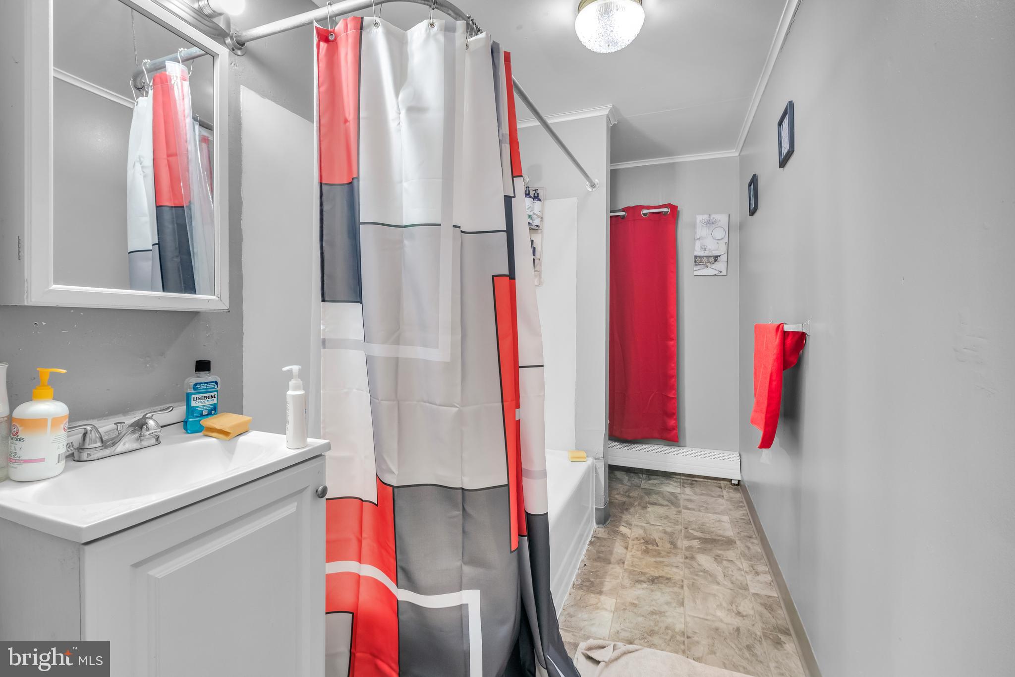 423 North Hall Street Allentown, PA 18102 - Photo 13 of 18 a view of walk in closet with clothes