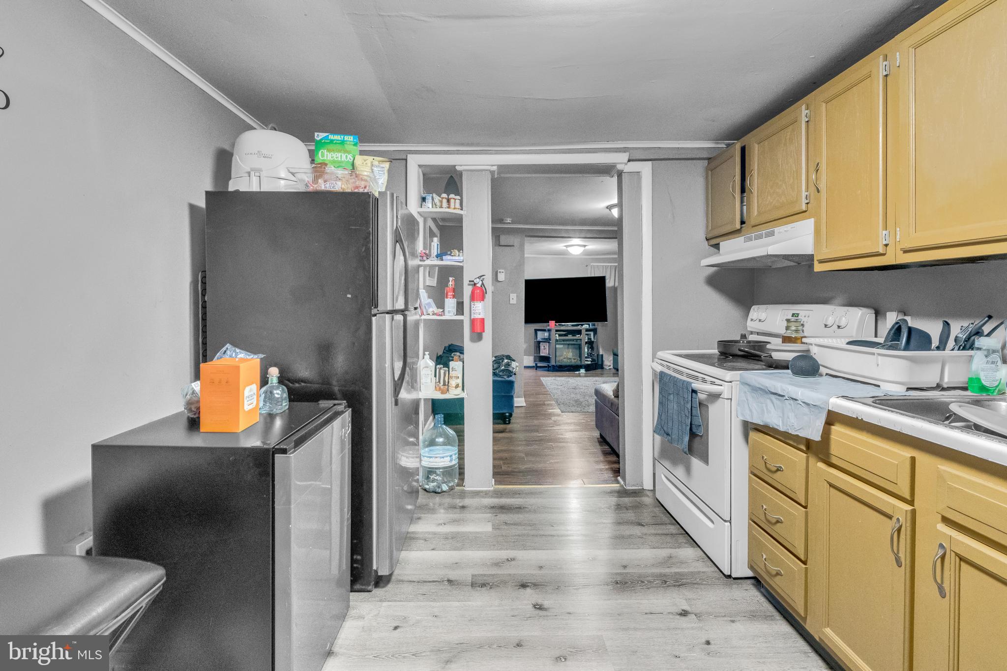 423 North Hall Street Allentown, PA 18102 - Photo 5 of 18 a kitchen with stainless steel appliances a refrigerator sink and stove top oven