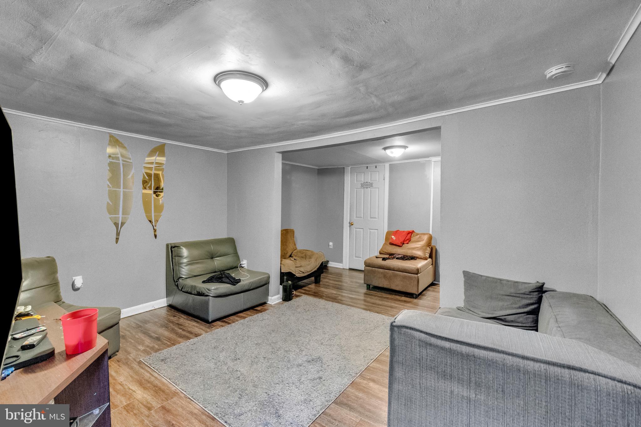 423 North Hall Street Allentown, PA 18102 - Photo 7 of 18 a living room with furniture and a couch