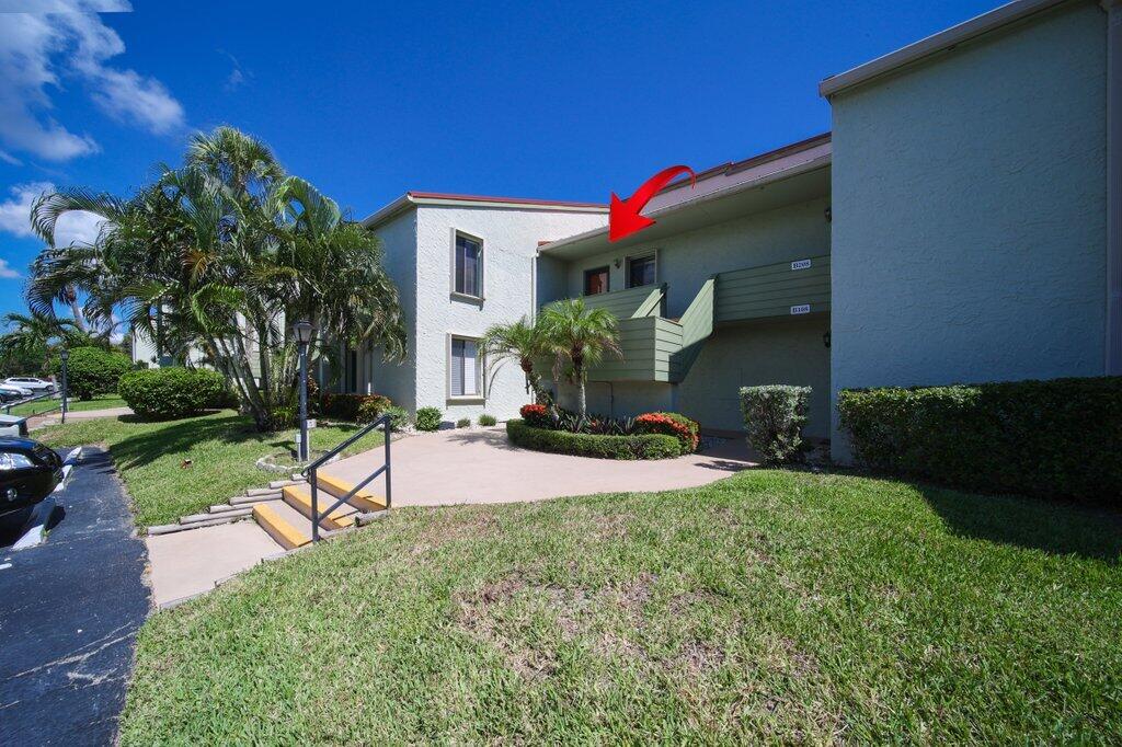 5463 Southeast Miles Grant Road, Unit 207 Stuart, FL 34997 - Photo 1 of 19 front2.jpg-SMALL