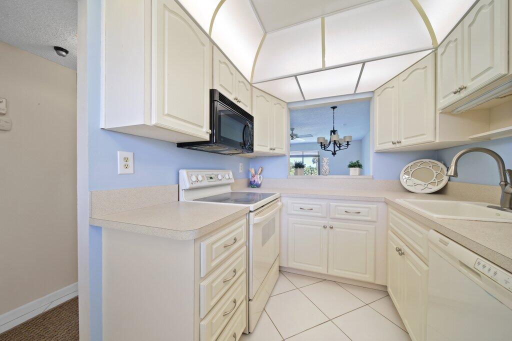 5463 Southeast Miles Grant Road, Unit 207 Stuart, FL 34997 - Photo 6 of 19 kitchen2.jpg-SMALL