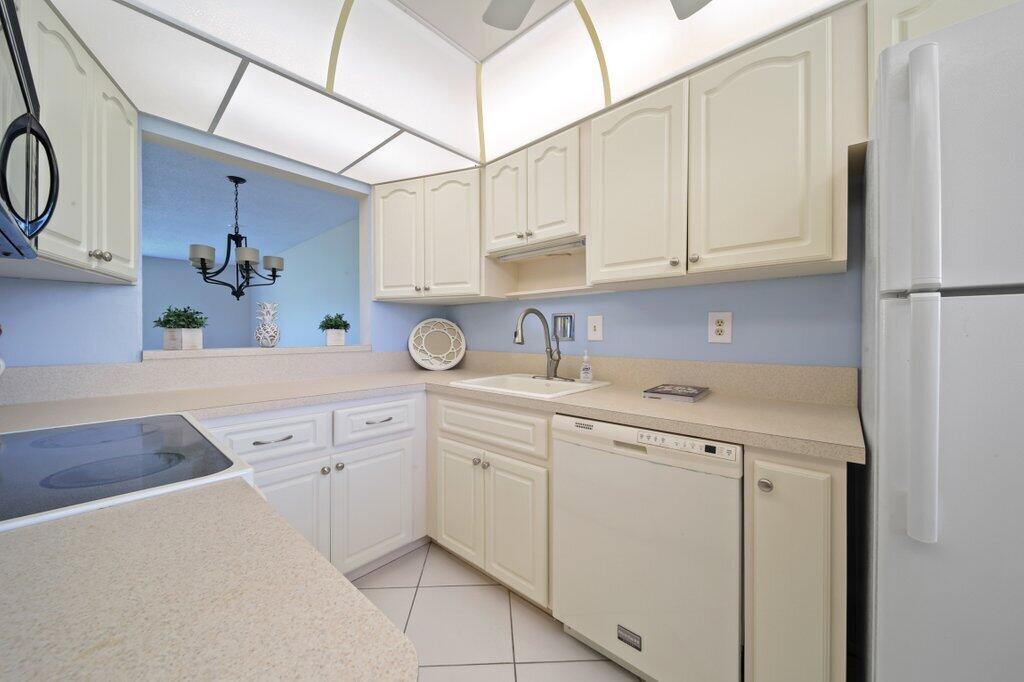 5463 Southeast Miles Grant Road, Unit 207 Stuart, FL 34997 - Photo 7 of 19 kitchen1.jpg-SMALL