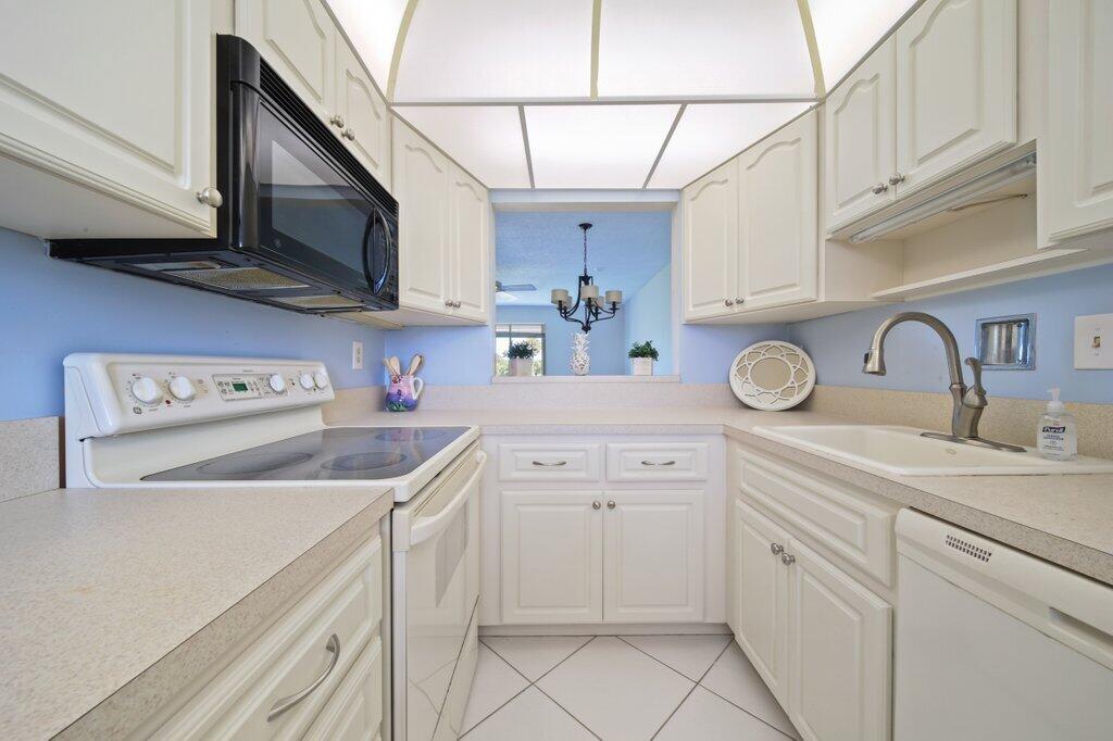 5463 Southeast Miles Grant Road, Unit 207 Stuart, FL 34997 - Photo 8 of 19 kitchen3.jpg-SMALL