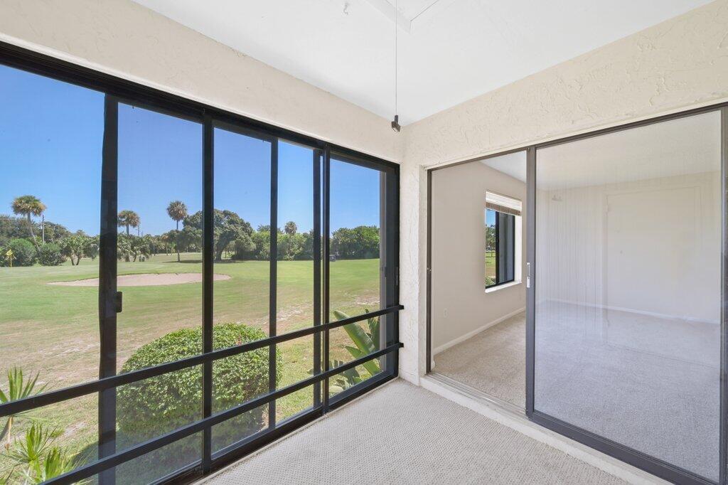 5463 Southeast Miles Grant Road, Unit 207 Stuart, FL 34997 - Photo 9 of 19 patio1.jpg-SMALL