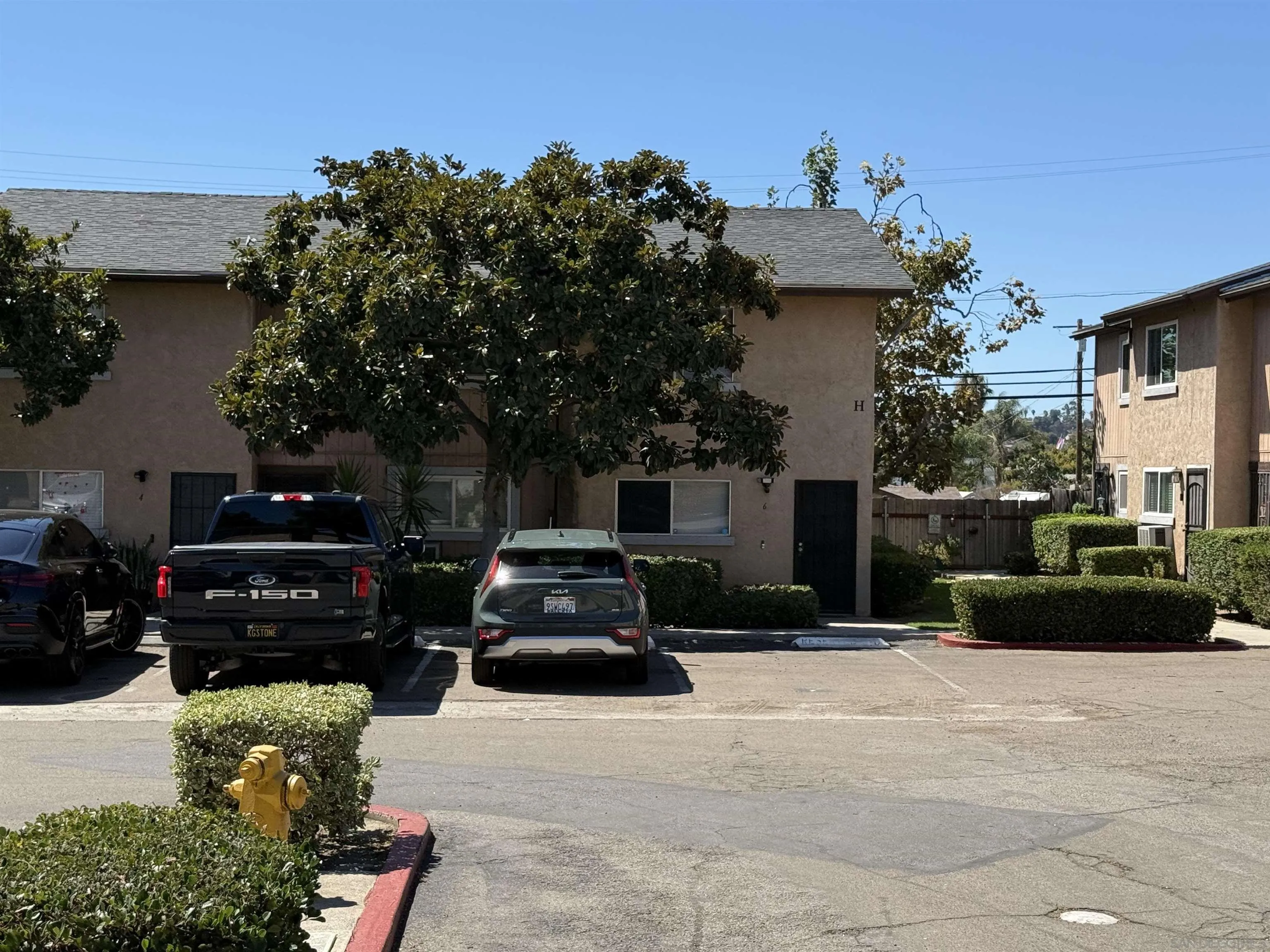 1034 Leland Street, Unit 14 Spring Valley, CA 91977 - Photo 1 of 7 a car parked in front of a house