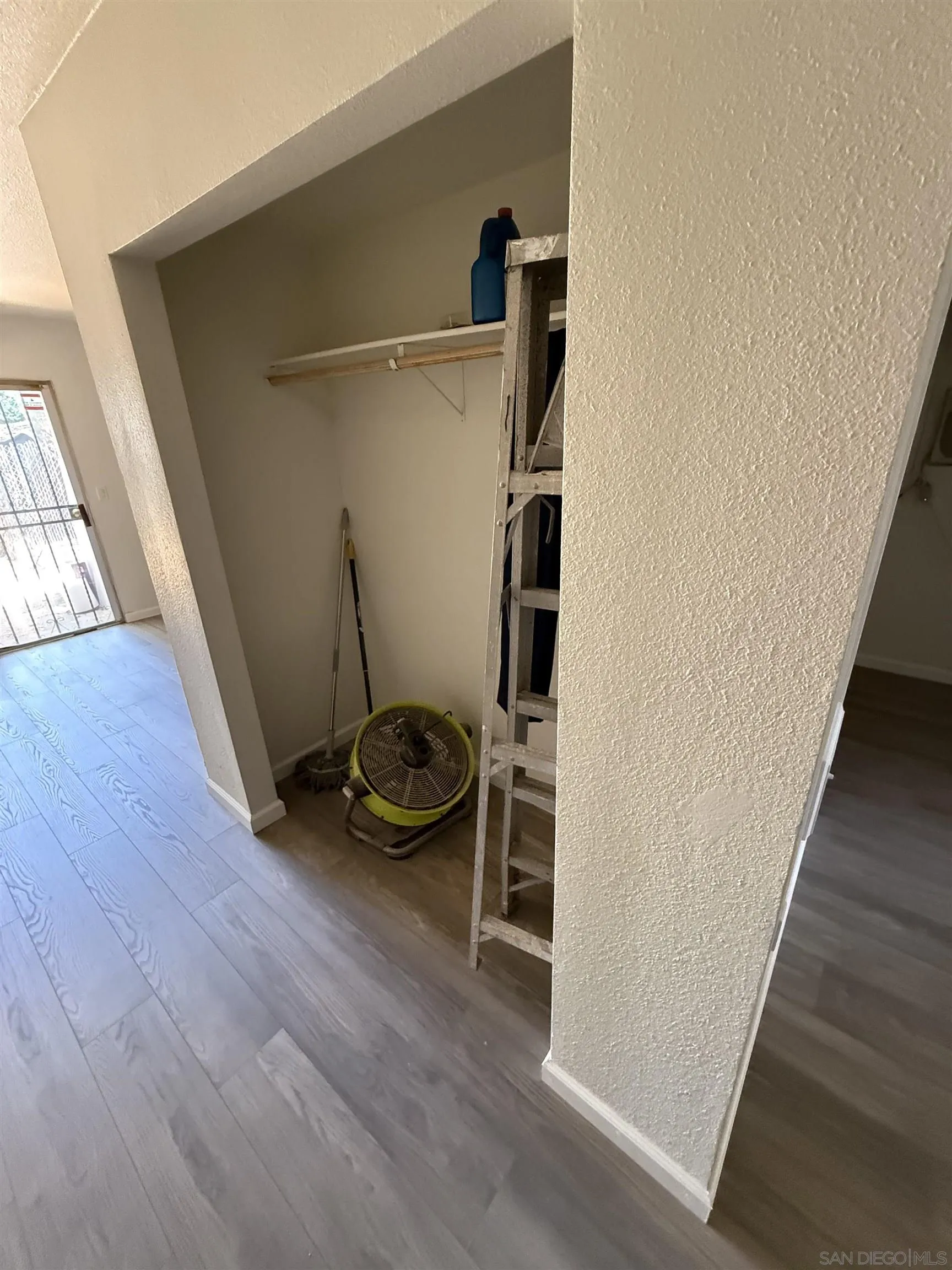 1034 Leland Street, Unit 14 Spring Valley, CA 91977 - Photo 4 of 7 an entryway in a hall with wooden floor