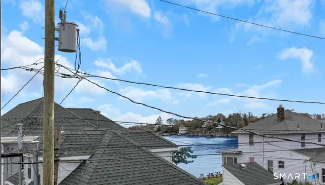 a view of a street with a houses