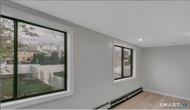 a view of hallway with a large window