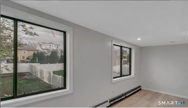 a view of hallway with a large window
