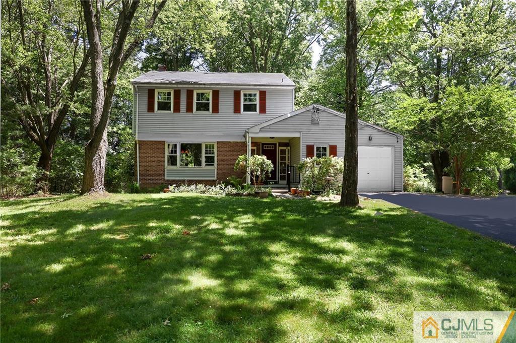 17 Taylor Road Monmouth Junction, NJ 08852 - Photo 1 of 25 a front view of a house with a garden