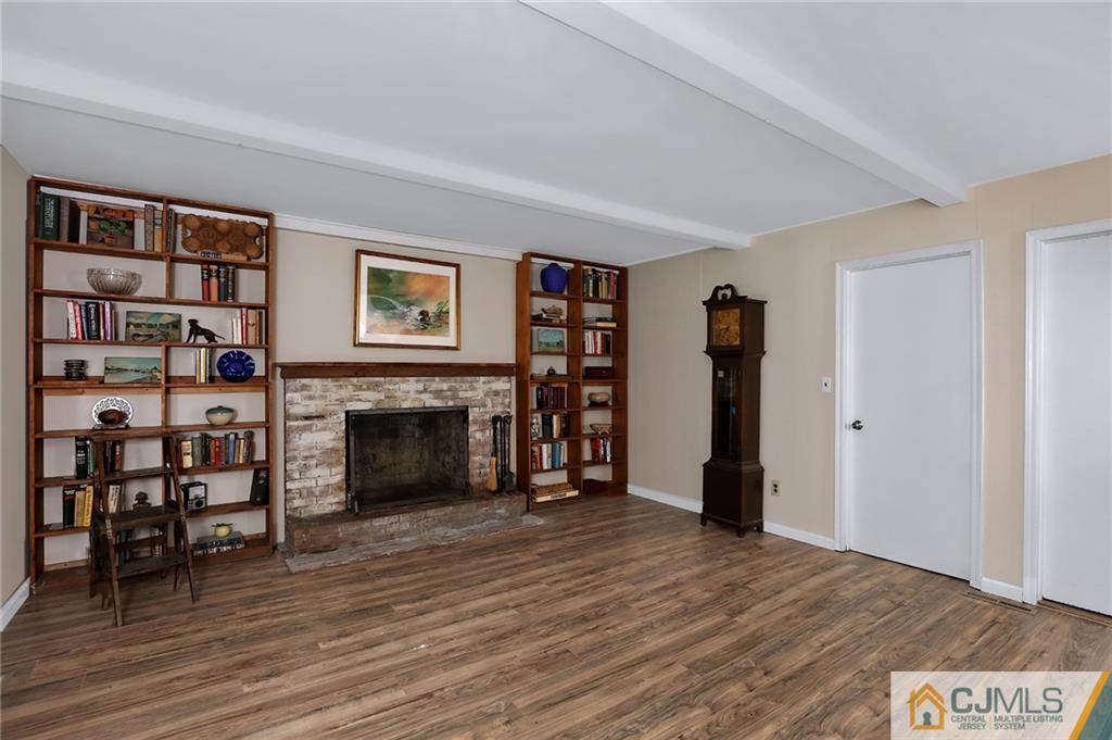 17 Taylor Road Monmouth Junction, NJ 08852 - Photo 13 of 25 a view of a livingroom with furniture and staircase