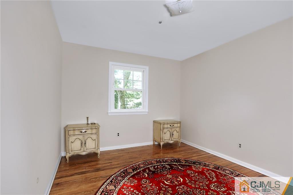 17 Taylor Road Monmouth Junction, NJ 08852 - Photo 20 of 25 a living room with couch