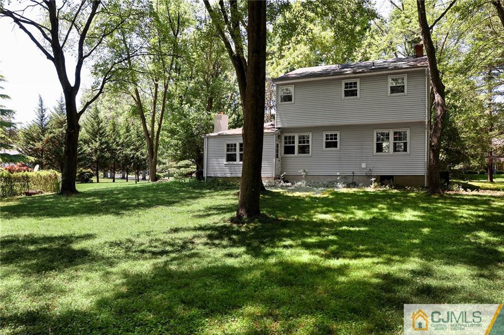 17 Taylor Road Monmouth Junction, NJ 08852 - Photo 23 of 25 a view of a house with yard and a tree