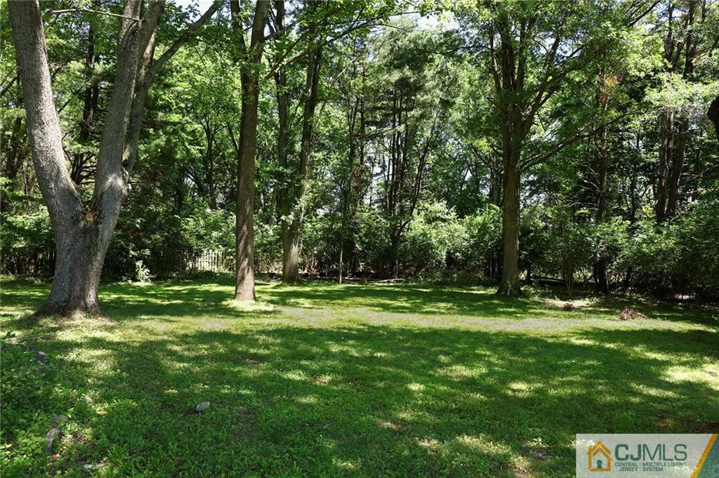 17 Taylor Road Monmouth Junction, NJ 08852 - Photo 24 of 25 a backyard of a house with swimming pool and green space