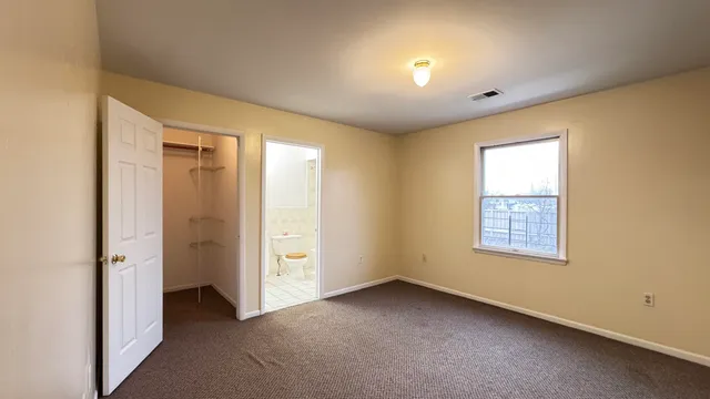 a bathroom with a sink a toilet and bathtub