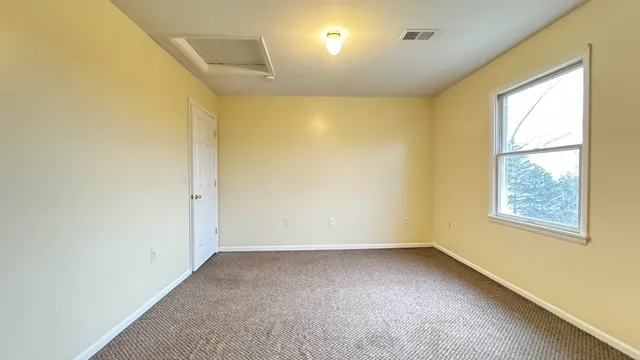 a bathroom with a sink toilet and vanity