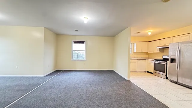 a view of a kitchen with a sink