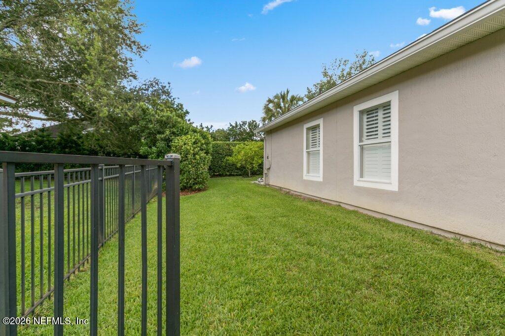 841 Ifield Road St. Augustine, FL 32095 - Photo 50 of 69 a backyard of a house with lots of green space