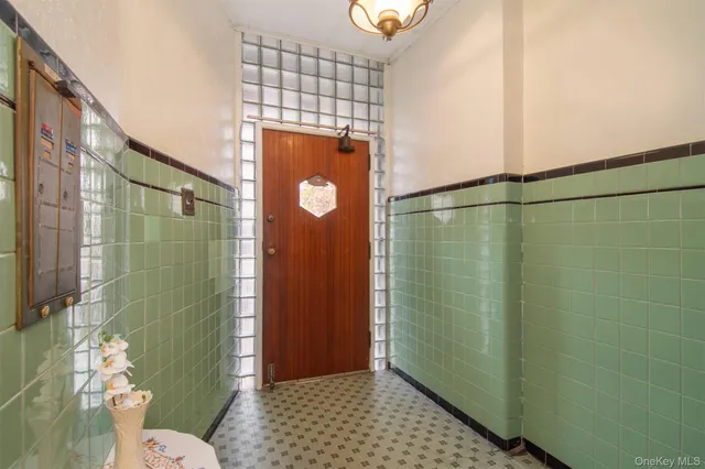 a bathroom with a shower and a toilet