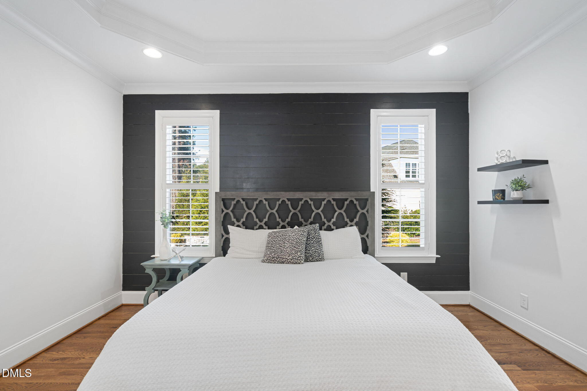 2414 Vetrina Way Apex, NC 27502 - Photo 21 of 60 a bedroom with a large bed and a window