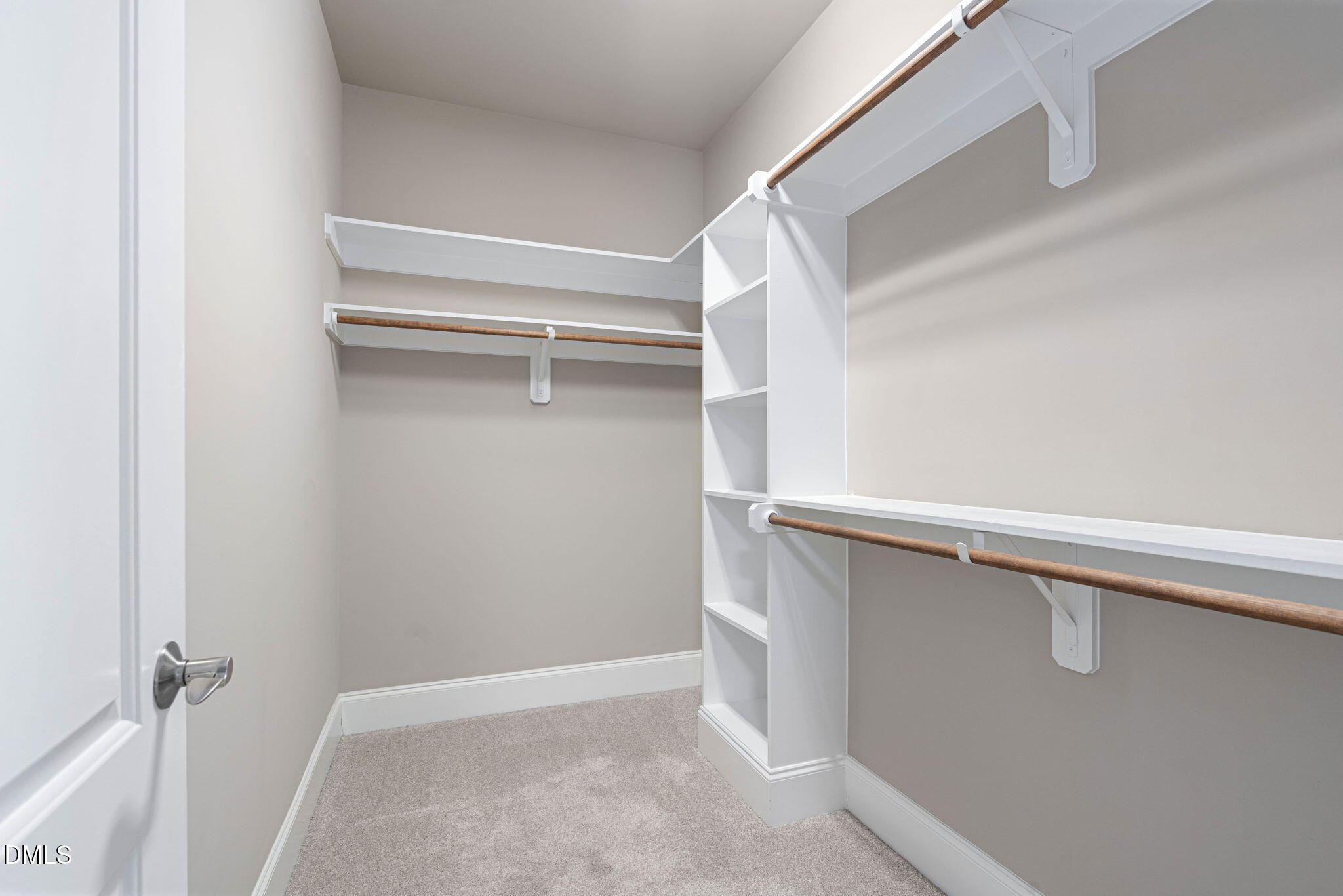 2414 Vetrina Way Apex, NC 27502 - Photo 31 of 60 a view of an empty walk in closet