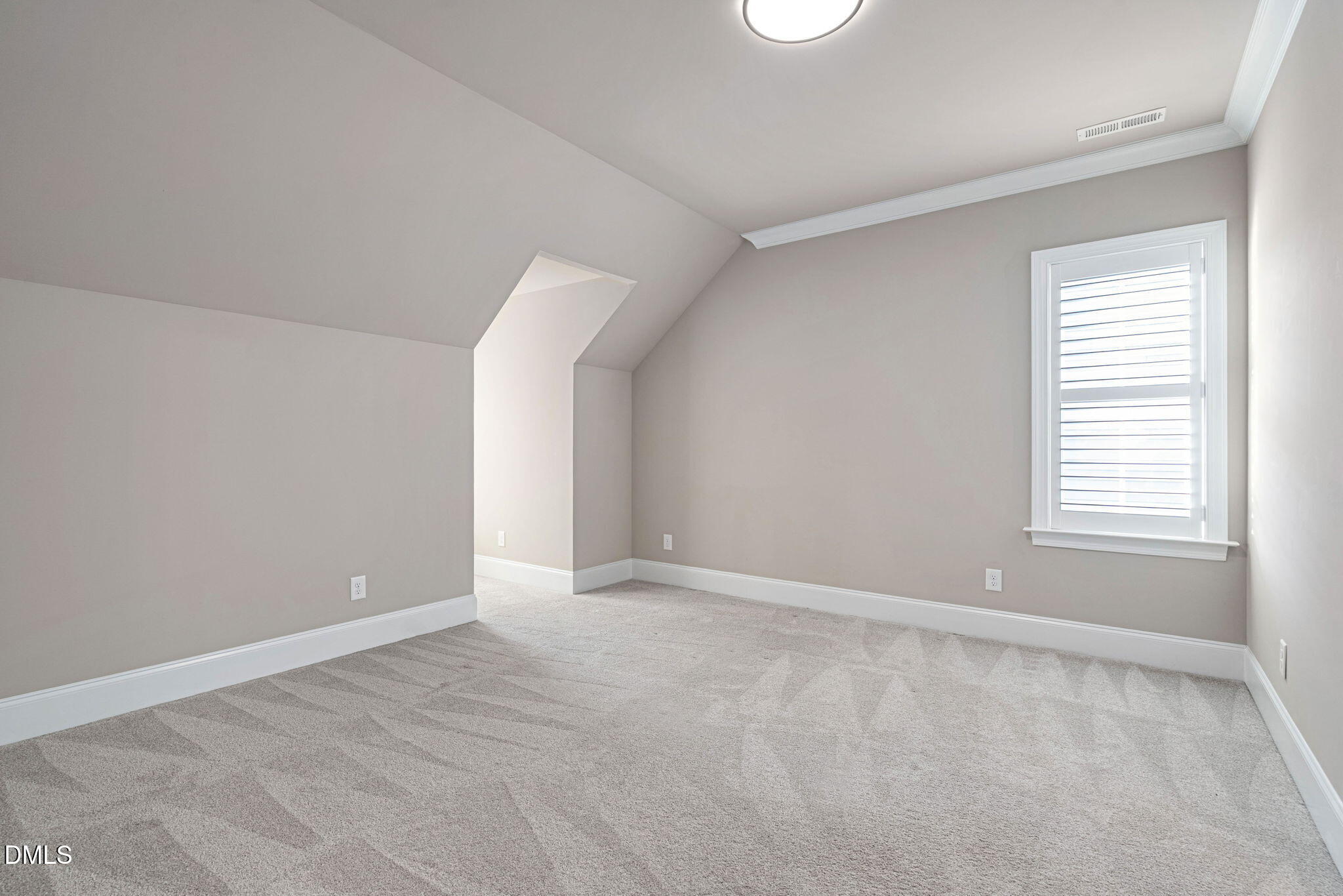 2414 Vetrina Way Apex, NC 27502 - Photo 37 of 60 a view of an empty room with a window