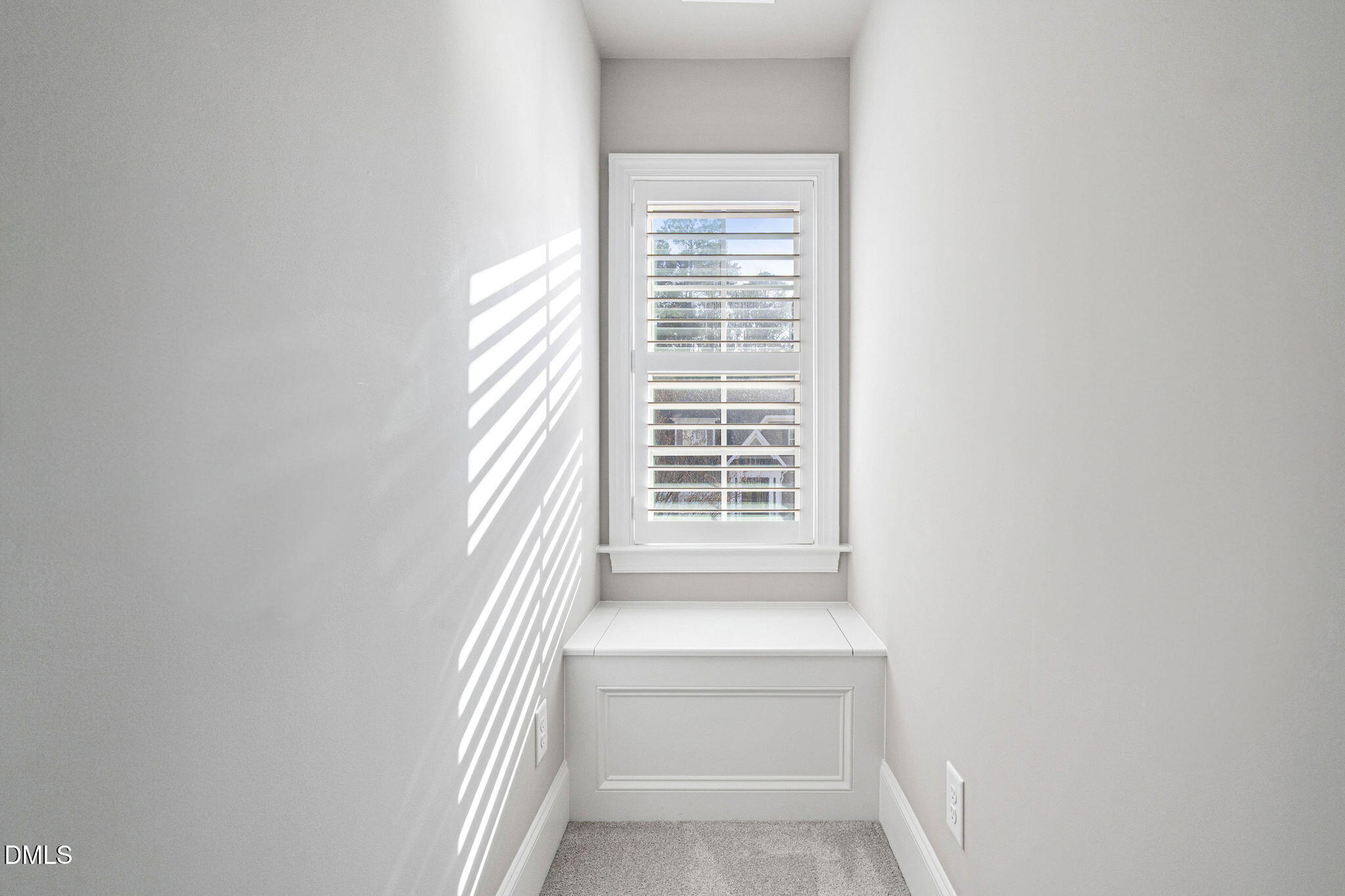 2414 Vetrina Way Apex, NC 27502 - Photo 39 of 60 a view of wooden floor and windows in a room