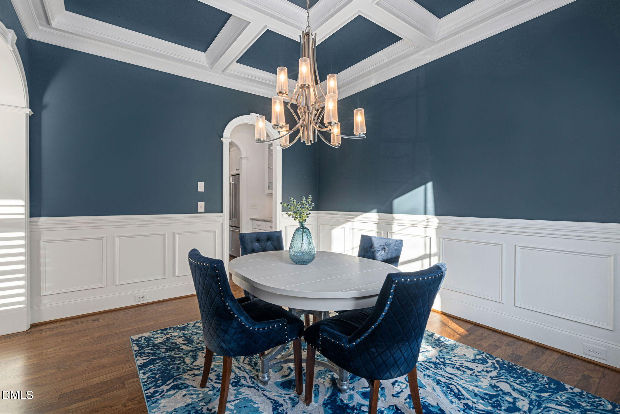 2414 Vetrina Way Apex, NC 27502 - Photo 4 of 60 a view of a dining room with furniture and wooden floor