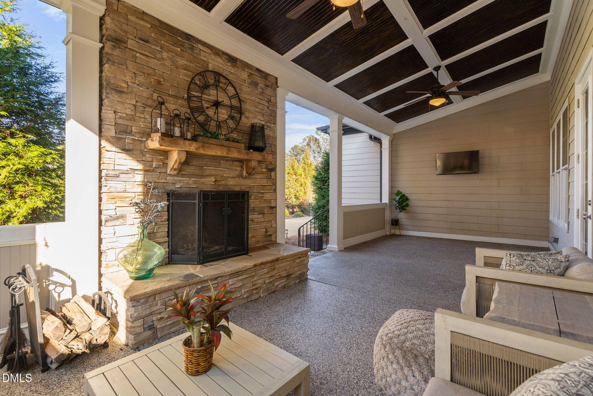 2414 Vetrina Way Apex, NC 27502 - Photo 46 of 60 a living room with furniture and a fireplace