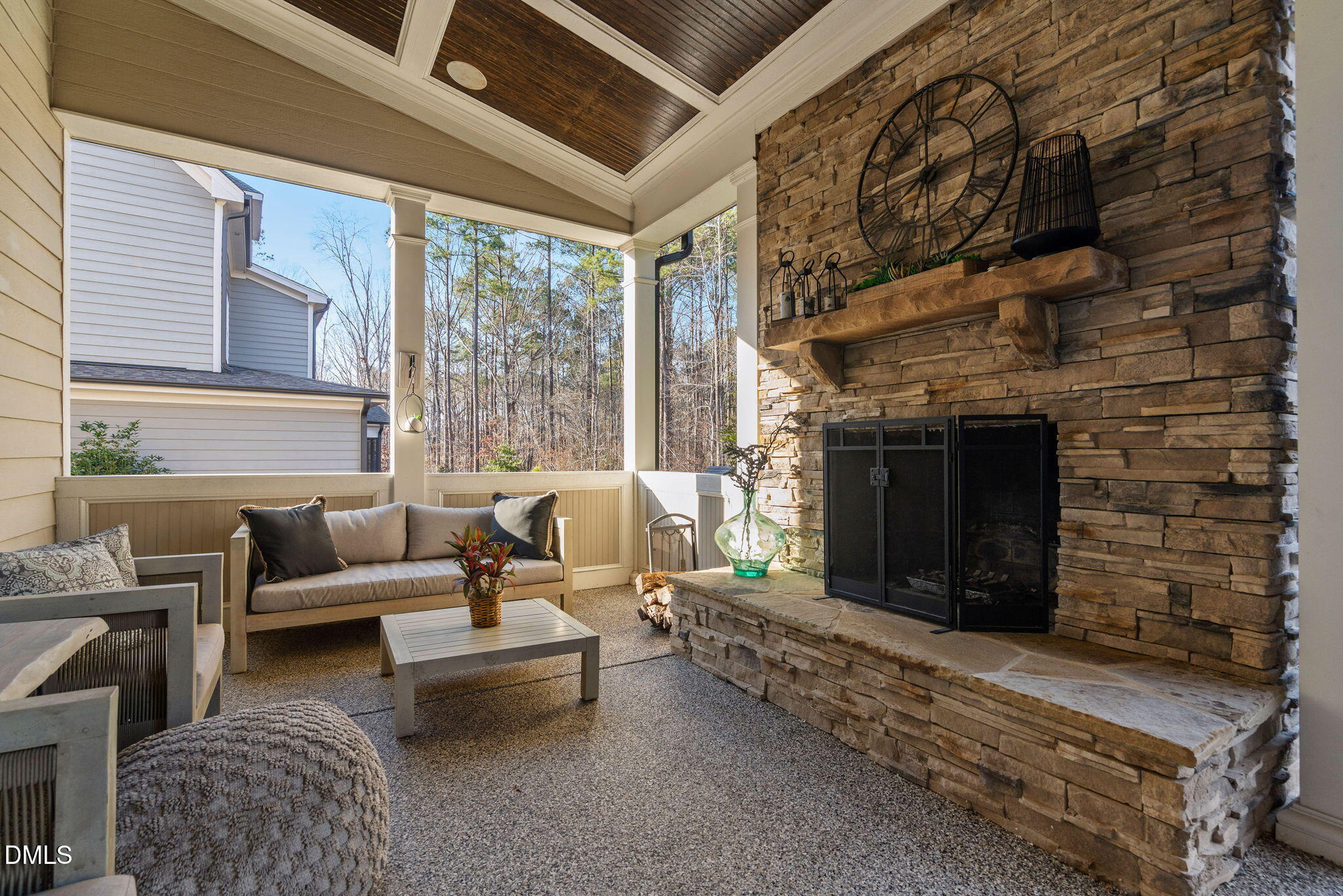 2414 Vetrina Way Apex, NC 27502 - Photo 48 of 60 a living room with furniture and a fireplace