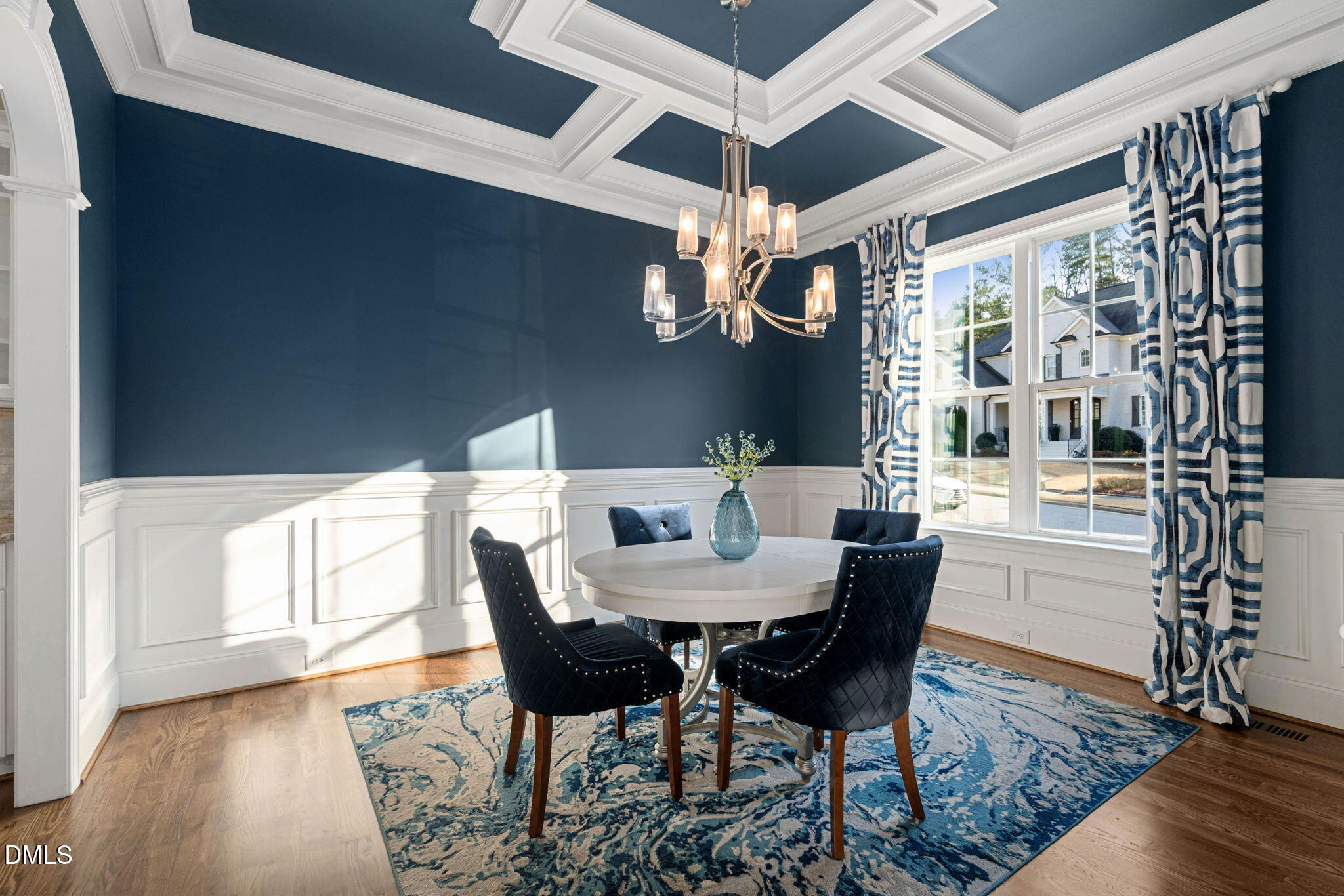 2414 Vetrina Way Apex, NC 27502 - Photo 5 of 60 a view of a dining room with furniture wooden floor and chandelier
