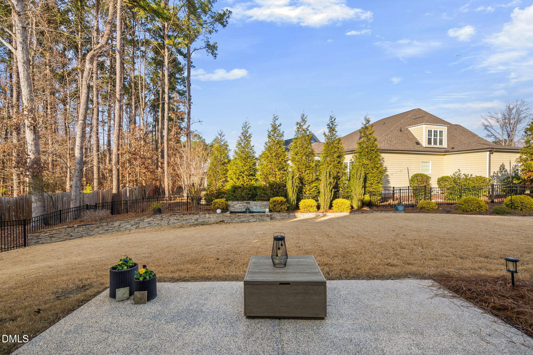2414 Vetrina Way Apex, NC 27502 - Photo 56 of 60 a swimming pool with outdoor seating and yard
