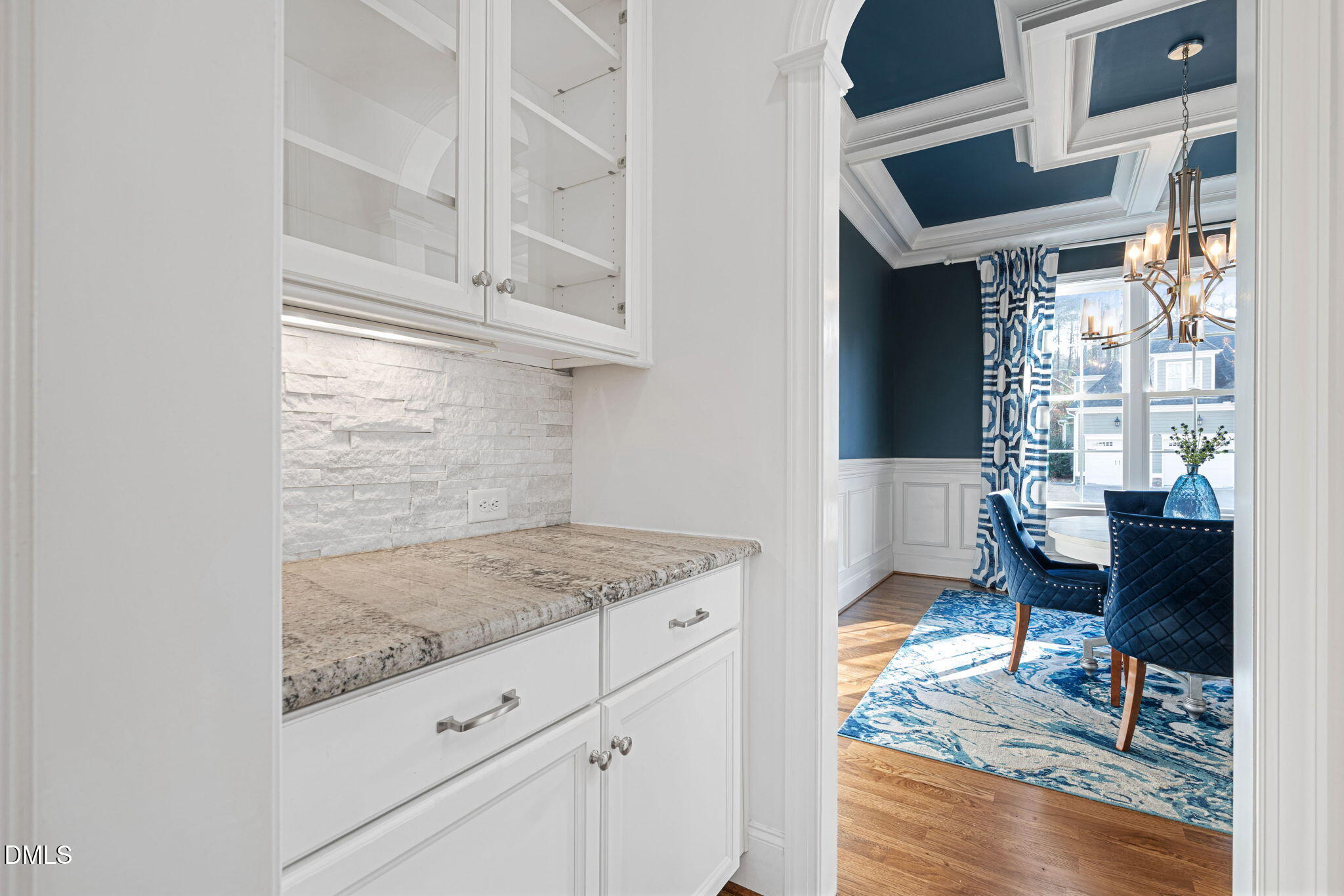 2414 Vetrina Way Apex, NC 27502 - Photo 6 of 60 a living room with granite countertop furniture and a fireplace